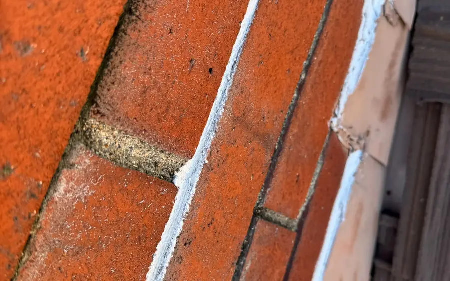 Chimney brick and mortar joints prepared for sealing
